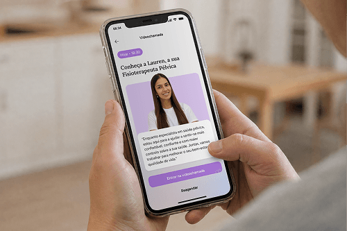 Person holding a smartphone displaying an app with information about a pelvic physiotherapist named Lauren, showing a profile picture and description.